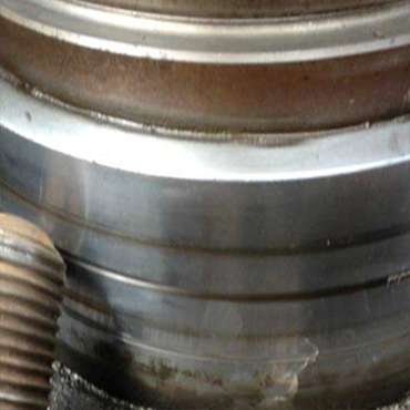 水泥生料磨輥軸磨損修復